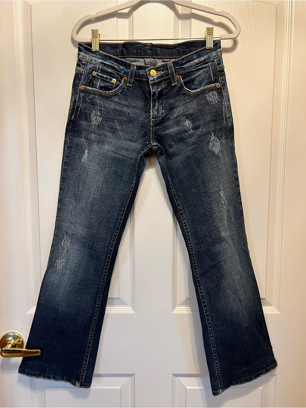 Armani Exchange Women's Dark Blue Flared Jeans with Subtle Distress
